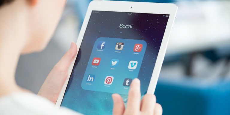 Woman using tablet device